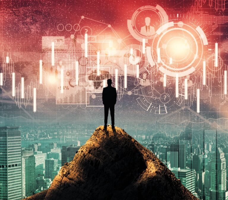 A silhouetted businessman on a mountain peak above a city skyline, with financial charts, data streams, and network diagrams overlaid across the sky, illustrating the vantage point needed to read the market's signals and see a business as a whole system